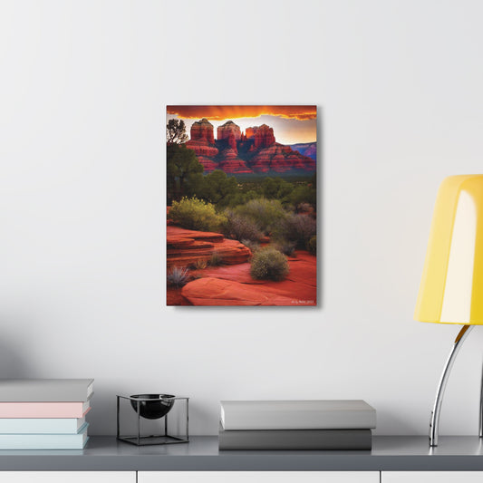 Trio of red rock formations at sunrise